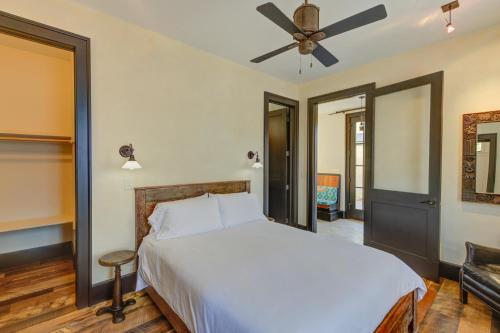 a bedroom with a bed and a ceiling fan at South Main Residences by Surf Hotel in Buena Vista