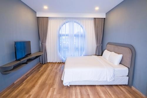 Ένα ή περισσότερα κρεβάτια σε δωμάτιο στο Hafi Boutique Hotel