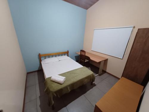 En eller flere senger på et rom på Casa de Campo areal