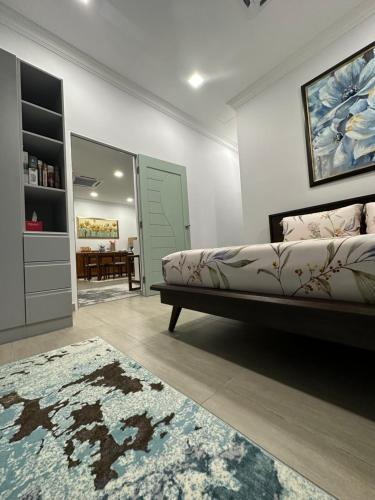 Postel nebo postele na pokoji v ubytování Tiny House PT82 Kg Gumut Tambahan