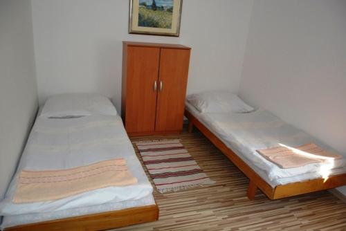 En eller flere senger på et rom på Chatová osada Kotva Prístav