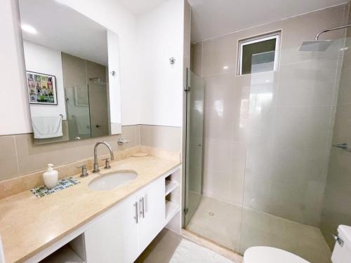 a bathroom with a sink and a shower at Apartamento Cartagena Morros Epic in Cartagena de Indias
