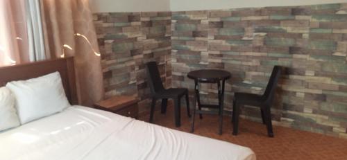 Cama o camas de una habitación en Residencial derosas