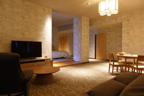 TV a/nebo společenská místnost v ubytování Resort Hotel RAKI House Nasu