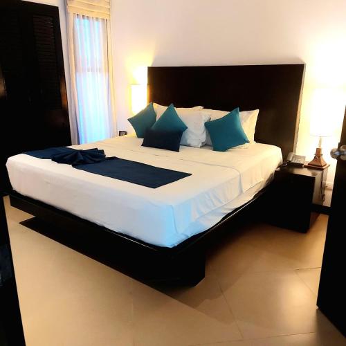 Ένα ή περισσότερα κρεβάτια σε δωμάτιο στο Dewa One bedroom suite