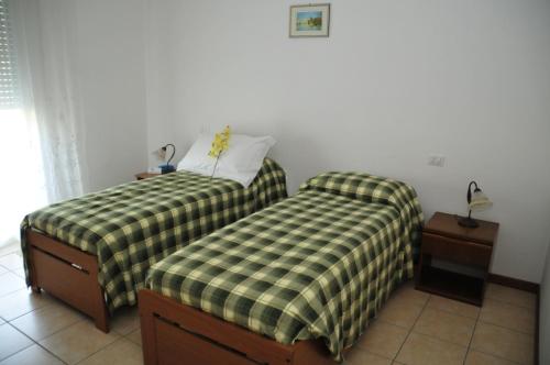 A bed or beds in a room at Casablanca