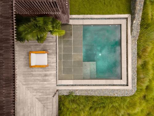 an overhead view of a swimming pool in a house at Menjaga Bay in Labuan Bajo