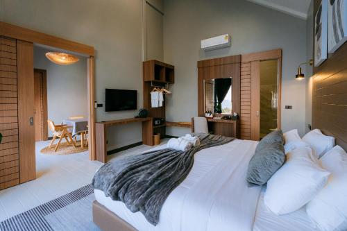 Televisyen dan/atau pusat hiburan di Misty Valley Doichang Private Pool Villa