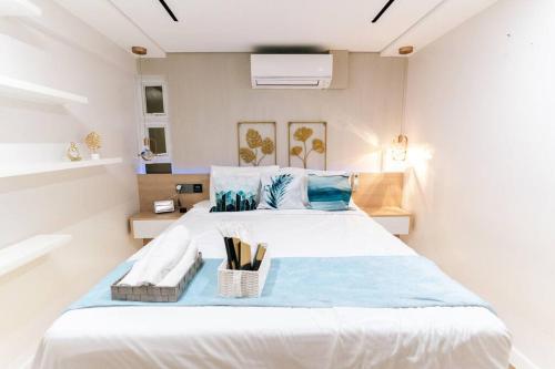 En eller flere senger på et rom på Marsy Luxury Staycation 3 Bedrooms