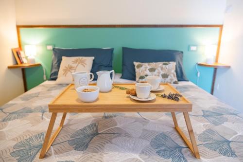 Ένα ή περισσότερα κρεβάτια σε δωμάτιο στο Il dolce Rifugio di Carlotta con vista su Orvieto