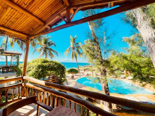 a view from the balcony of a resort with a swimming pool at VOVO TELO LODGE in Toliara