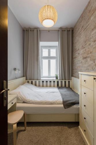 Voodi või voodid majutusasutuse Spacious and quiet apartment in the city centre toas