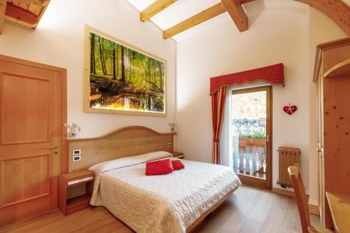 Cama ou camas em um quarto em Albergo Eden