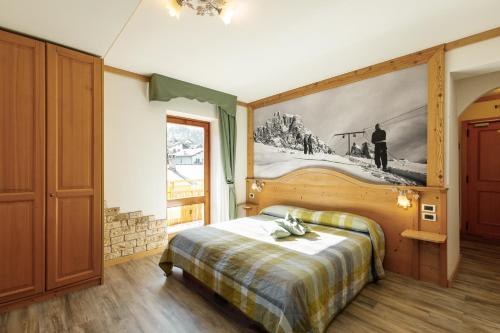 Cama ou camas em um quarto em Albergo Eden