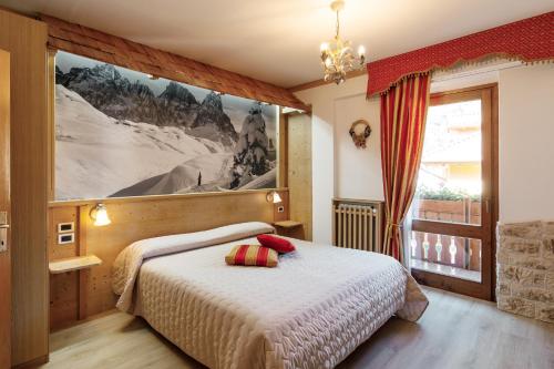 Cama ou camas em um quarto em Albergo Eden