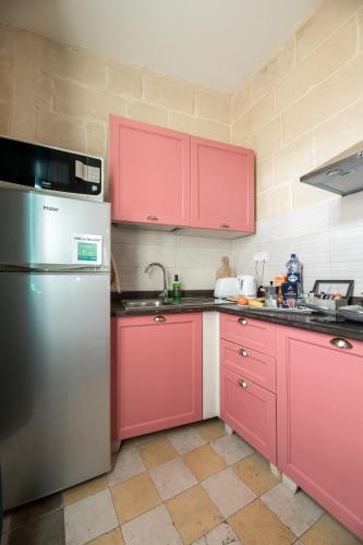Una cocina o cocineta en Concetta Studio Apartments by Holihomes