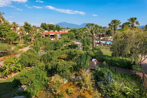an overhead view of a park with trees and bushes at Club Tuana Fethiye - All Inclusive in Fethiye
