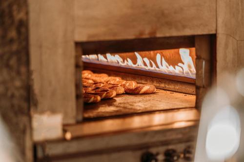 a group of croissants are coming out of an oven at Club Tuana Fethiye - All Inclusive in Fethiye