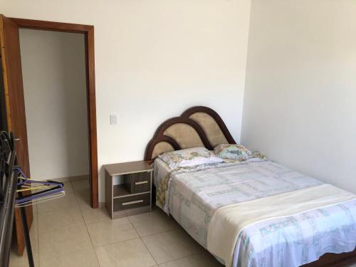 Ένα ή περισσότερα κρεβάτια σε δωμάτιο στο Casa na praia d Ulé - Guarapari