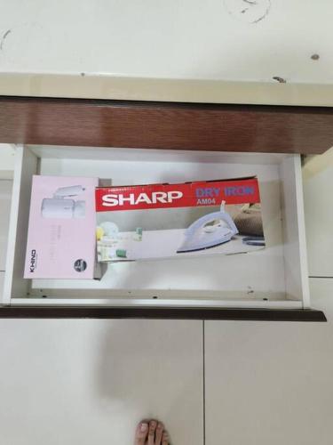 a box on top of a kitchen counter with a computer mouse at IPOH BOTANI bauhaus 17pax/4BR/mahjong/tv box in Ipoh