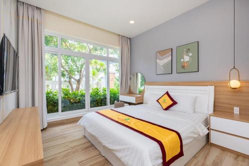 Postel nebo postele na pokoji v ubytování R7 Aria Resort