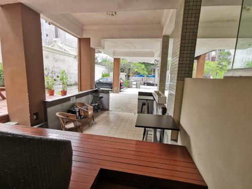 a view of the dining room and kitchen of a house at Greatwood Residence at Devonshire in Singapore