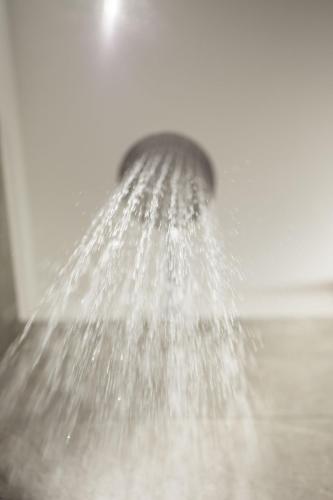 a shower head with water coming out of it at Residence Panorama Pfelders in Pfelders