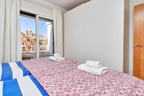 Postel nebo postele na pokoji v ubytování Apartamento Plaza España E1