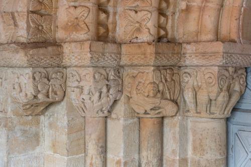 a stone wall with carvings on a building at Parador de Cangas de Onís in Villanueva de Cangas de Onís
