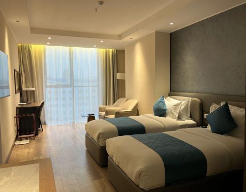 Postel nebo postele na pokoji v ubytování Sofia International Hotel