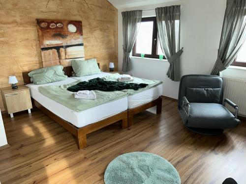 Uma cama ou camas num quarto em Pension Westerhuesen