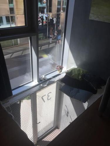 a view of a window with a view of a street at Beach house apartment in New York style in Aarhus