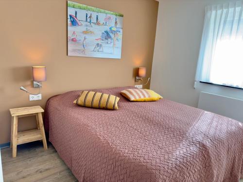 Postel nebo postele na pokoji v ubytování Zoutelande Koddelaan vakantiewoning