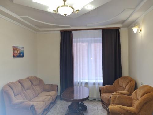 Ein Sitzbereich in der Unterkunft Hotel Complex Uhnovych