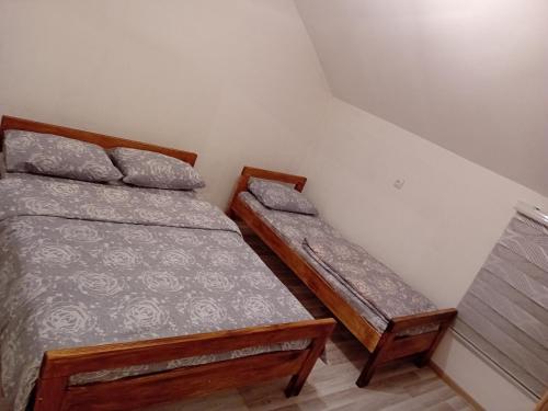 En eller flere senge i et værelse på Apartman Danica Foča
