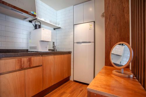 Una cocina o cocineta en Hotelarrive Taean Tiann HanokBeachResort