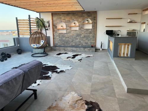 a living room with a cow rug on the floor at Sallam Lux Property in Hurghada