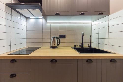 Una cocina o cocineta en Self Check-in Apartments Maidan Area