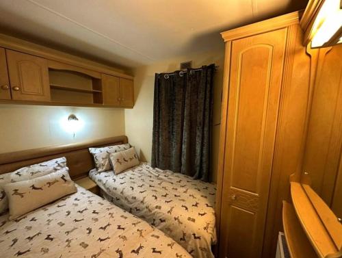 Katil atau katil-katil dalam bilik di A beautiful Dog Friendly Holiday Home