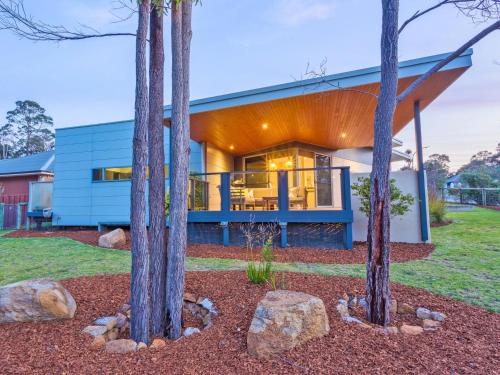 a house in the woods with trees at Banyandah - Dog Friendly - Family & Groups Welcome in Margaret River Town