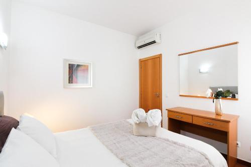 Postel nebo postele na pokoji v ubytování Casa Garcia - Marina Park