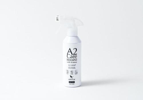 a bottle of a care product on a white background at APA Hotel Osaka Temma in Osaka