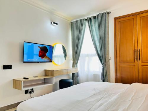 Кровать или кровати в номере Mulliner luxury APARTMENTS ( 3 BEDROOM )