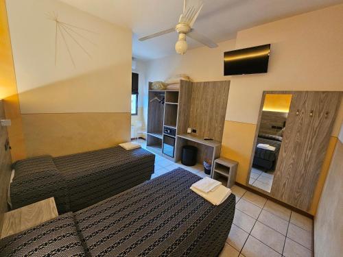 Postel nebo postele na pokoji v ubytování Hotel Euro
