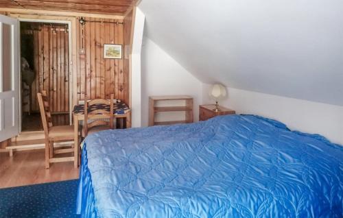 Ένα ή περισσότερα κρεβάτια σε δωμάτιο στο 4 Bedroom Gorgeous Home In Kamianna