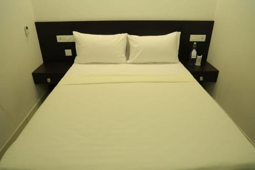 Postel nebo postele na pokoji v ubytování Arctic Business Hotel