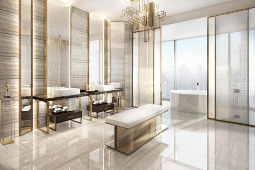 a bathroom with two sinks and a tub at JW Marriott Hotel Nairobi in Nairobi