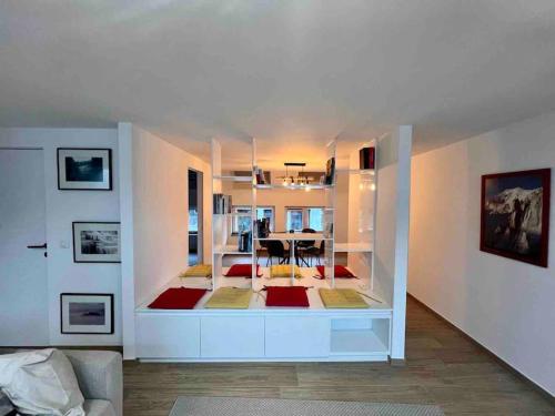 a room with a living room and a dining room at Le contemporain - Plein centre, place du Marché in Liège