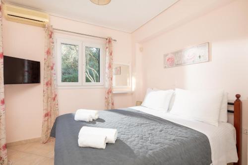 Postel nebo postele na pokoji v ubytování Eleonas Luxury Homes
