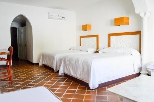 Postel nebo postele na pokoji v ubytování Hotel Aldea del Bazar & Spa